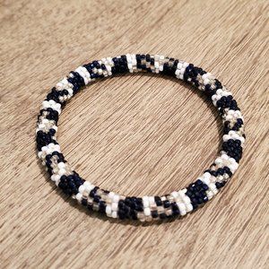Blue and white glass bead cord bracelet